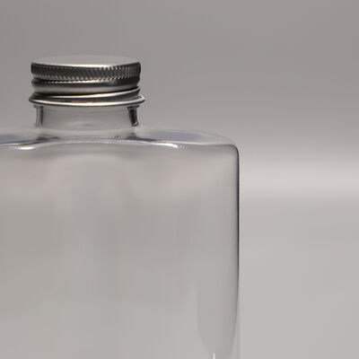 Tight Sealing BPA Free Plastic Bottles Transparent Durable Containers Designed for Safe Storage and Transport of Liquids